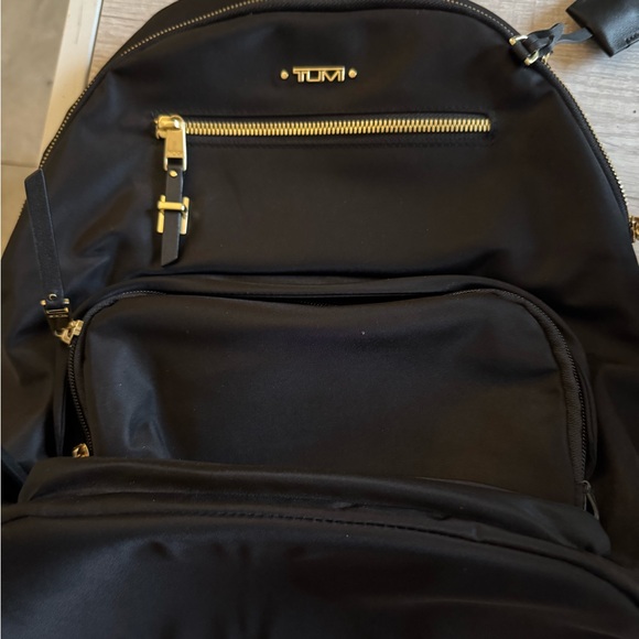 Tumi Black Backpack with Gold Accents - Picture 2 of 13